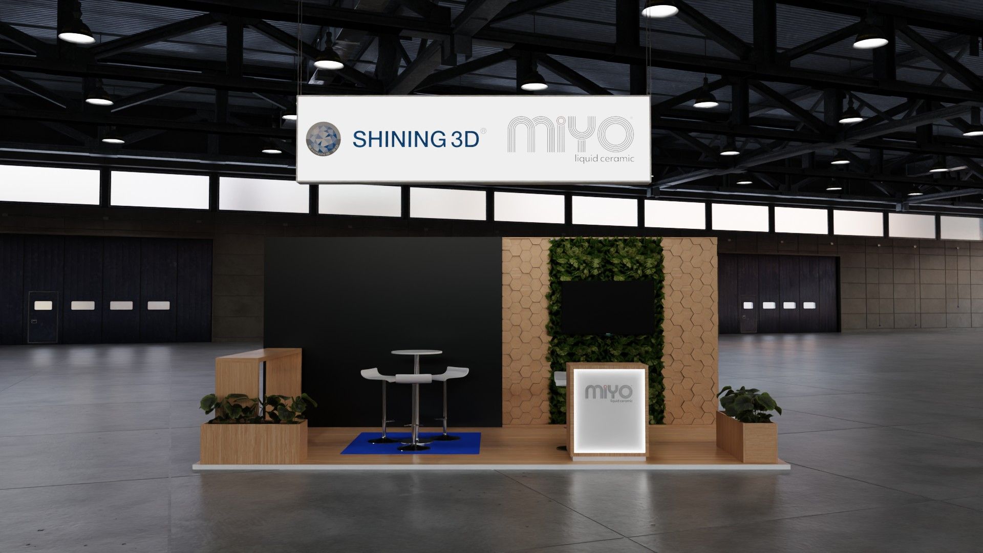 Stand SHINING 3D e MiYO visto de frente, com caixa de luz a preto, parede de jardim vertical com ecrã e balcão iluminado, sob caixa de luz suspensa.